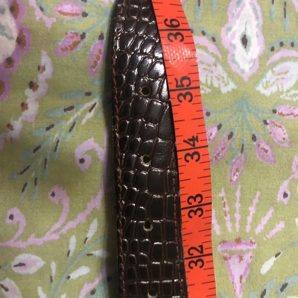 Gold and brown belt 35 inches to first hole. Size M